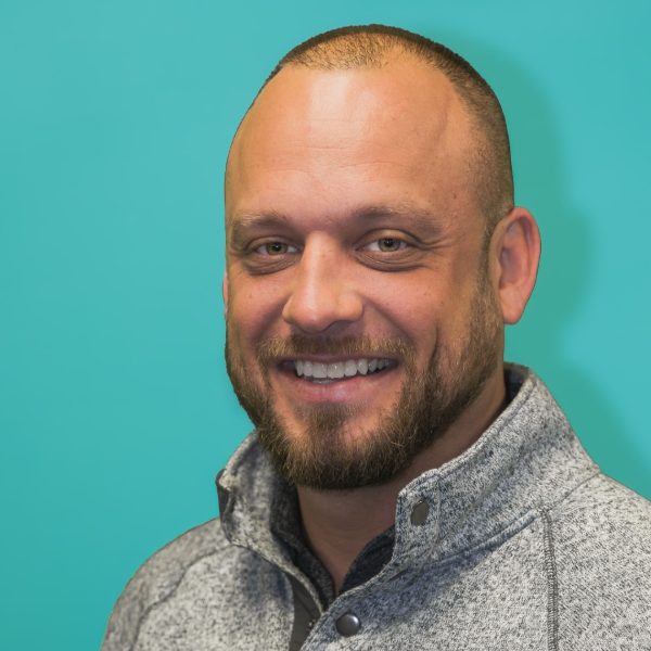 Aaron Christy founder Village of West Clay Roofing